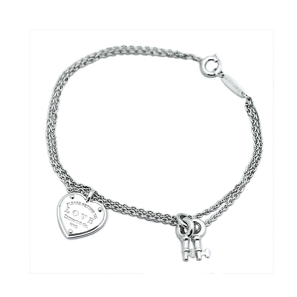 Tiffany Heart Tag Key 18K Gold Bracelet product image 1, provided for visual reference and product detail review