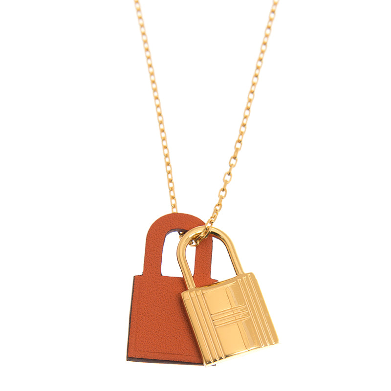 Hermes O'Kelly Orange Pendant 18K Gold Necklace product image 1, provided for visual reference and product detail review