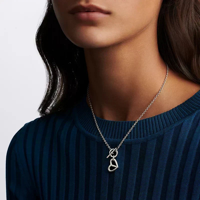 Hermes Cache-coeur Amulette Pendant 18K Gold Necklace product image 5, provided for visual reference and product detail