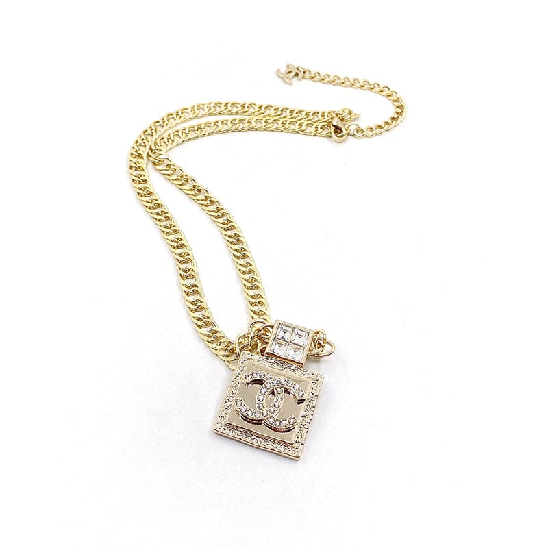 Chanel Metal & Diamond Pendant 18K Gold Necklace product image 5, provided for visual reference and product detail review