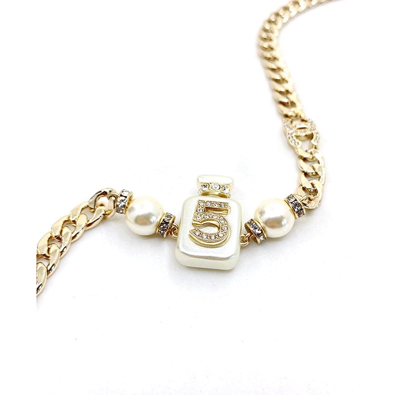 Chanel No. 5 Perfume Bottle Pendant 18K Gold Necklace product image 7, provided for visual reference and product detail