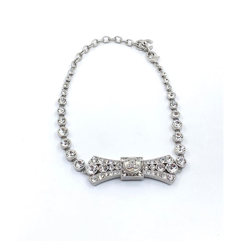 Chanel Diamond Bow Tie Pendant 18K Gold Necklace product image 3, provided for visual reference and product detail review