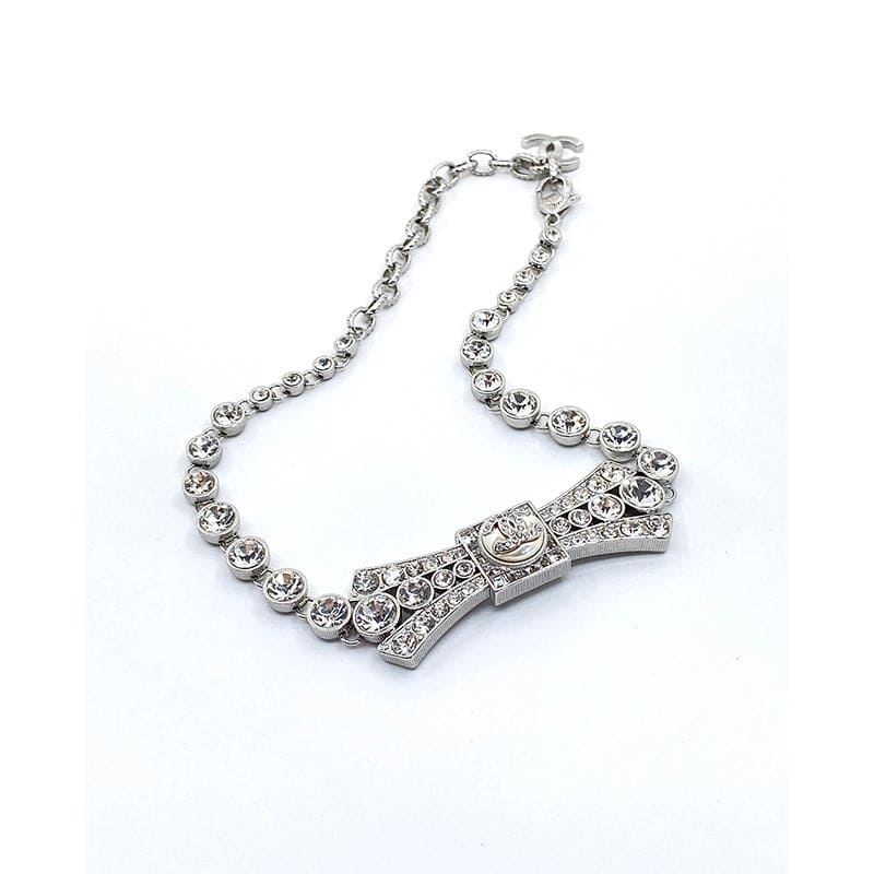 Chanel Diamond Bow Tie Pendant 18K Gold Necklace product image 4, provided for visual reference and product detail review