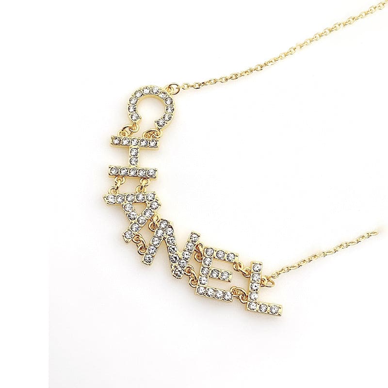 Chanel Crystal 90's Icon Logo 18K Gold Necklace product image 4, provided for visual reference and product detail review