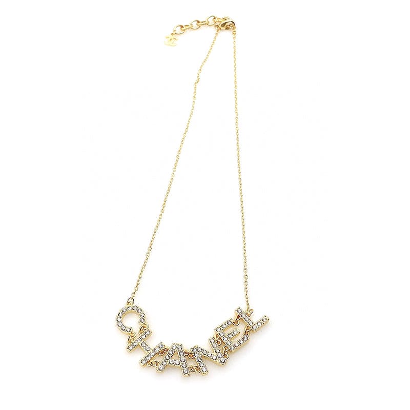 Chanel Crystal 90's Icon Logo 18K Gold Necklace product image 2, provided for visual reference and product detail review