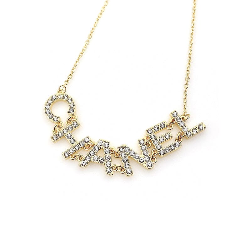 Chanel Crystal 90's Icon Logo 18K Gold Necklace product image 7, provided for visual reference and product detail review