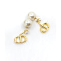 Tribales Pearl 18K Gold Earrings product image 1, provided for visual reference and product detail review