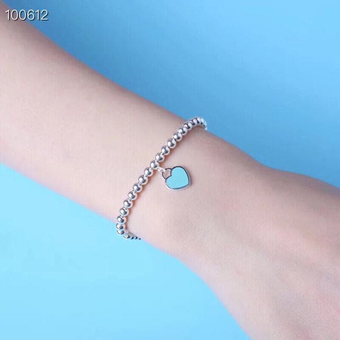 Tiffany Return to Blue Heart Tag Bead 18K Gold Bracelet product image 4, provided for visual reference and product detail