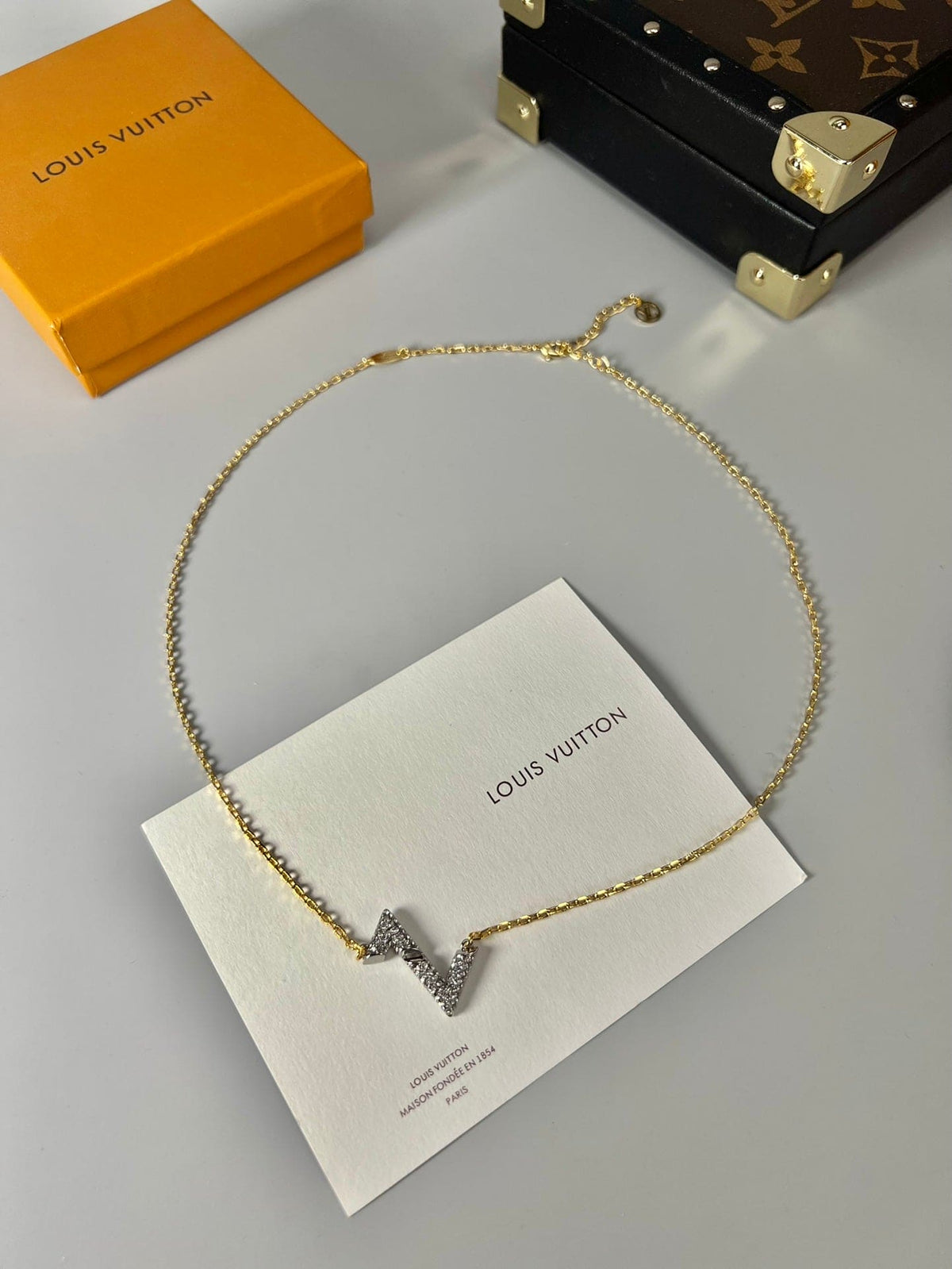 Louis Vuitton Volt Upside Down Pendant 18K Gold Necklace product image 4, provided for visual reference and product detail