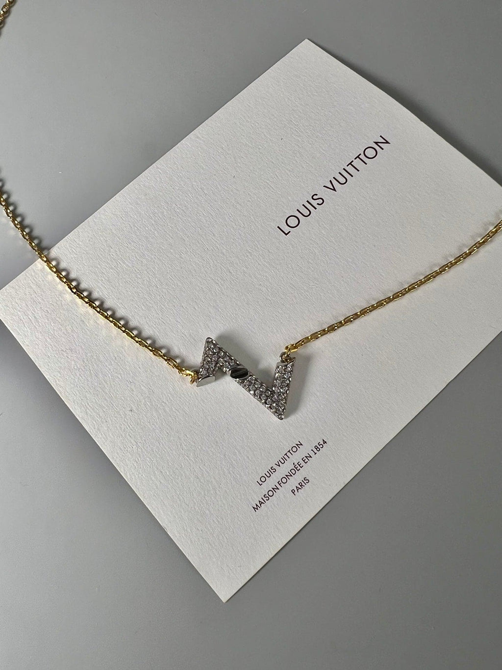 Louis Vuitton Volt Upside Down Pendant 18K Gold Necklace product image 5, provided for visual reference and product detail