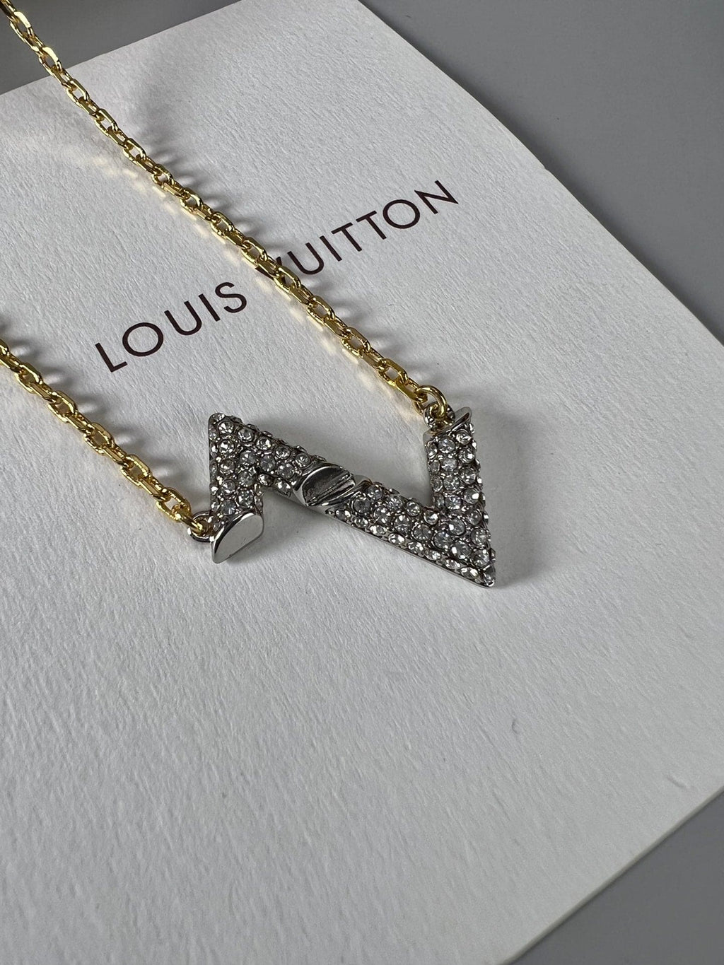 Louis Vuitton Volt Upside Down Pendant 18K Gold Necklace product image 7, provided for visual reference and product detail