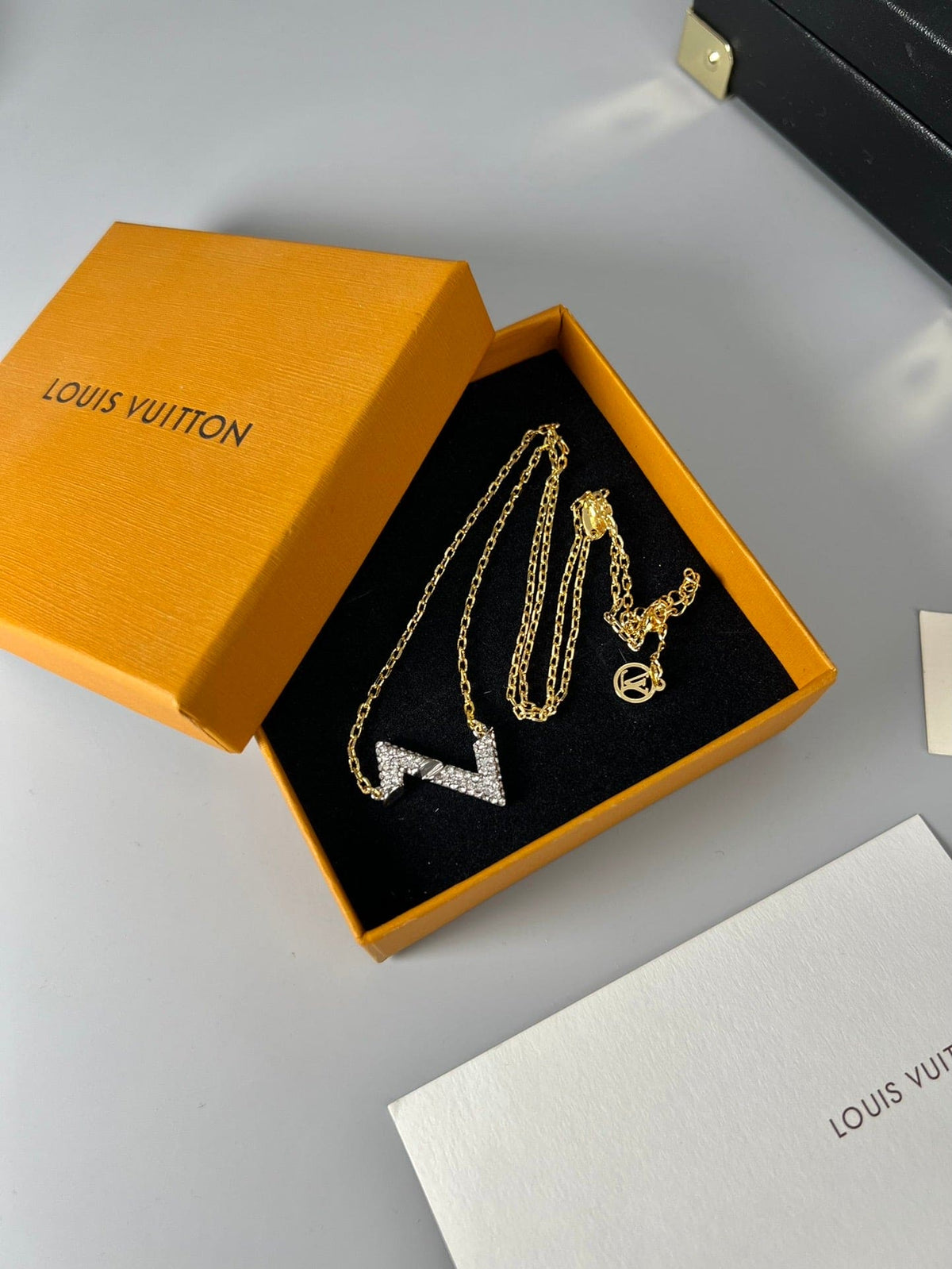 Louis Vuitton Volt Upside Down Pendant 18K Gold Necklace product image 8, provided for visual reference and product detail