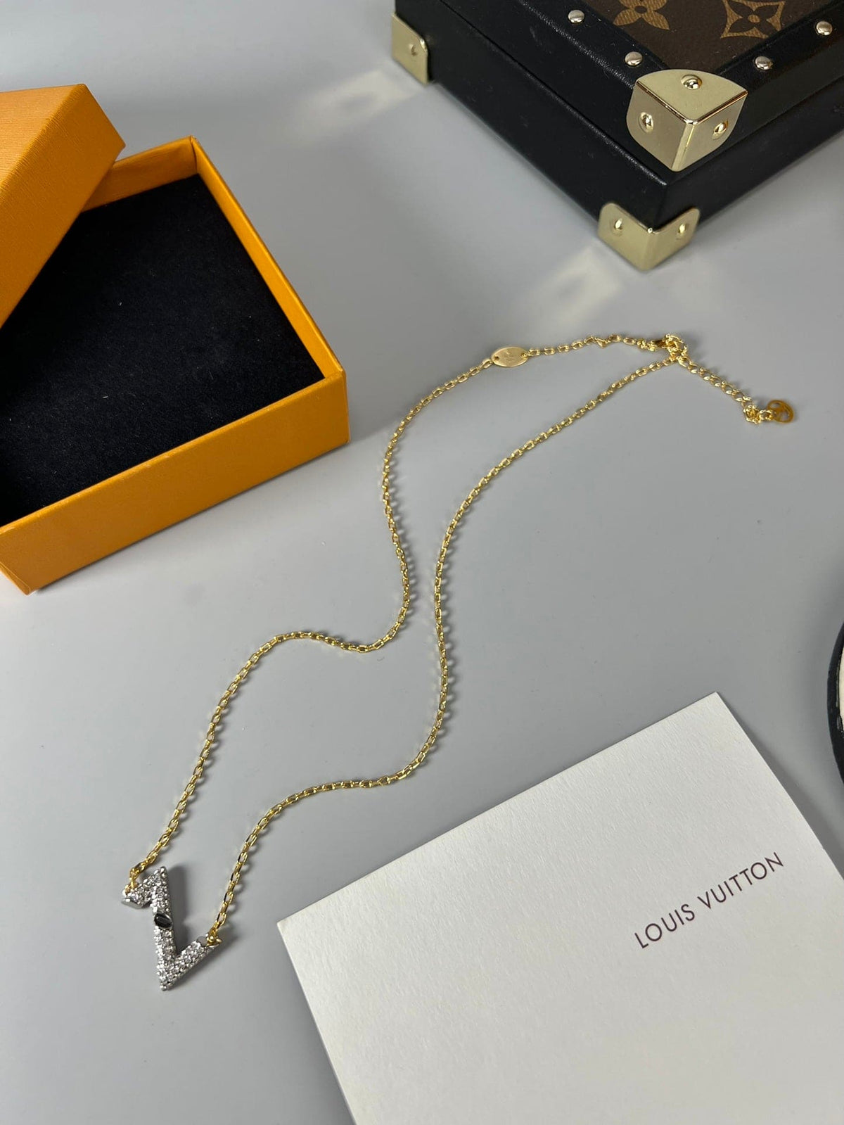 Louis Vuitton Volt Upside Down Pendant 18K Gold Necklace product image 9, provided for visual reference and product detail