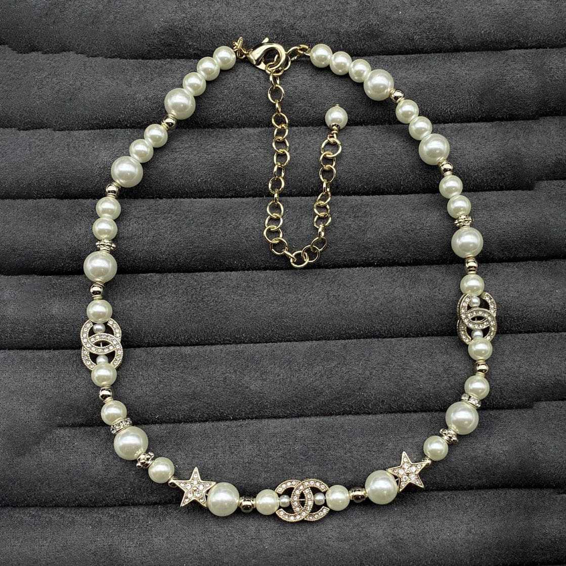Chanel Pearls & Stars 18K Gold Necklace product image 1, provided for visual reference and product detail review