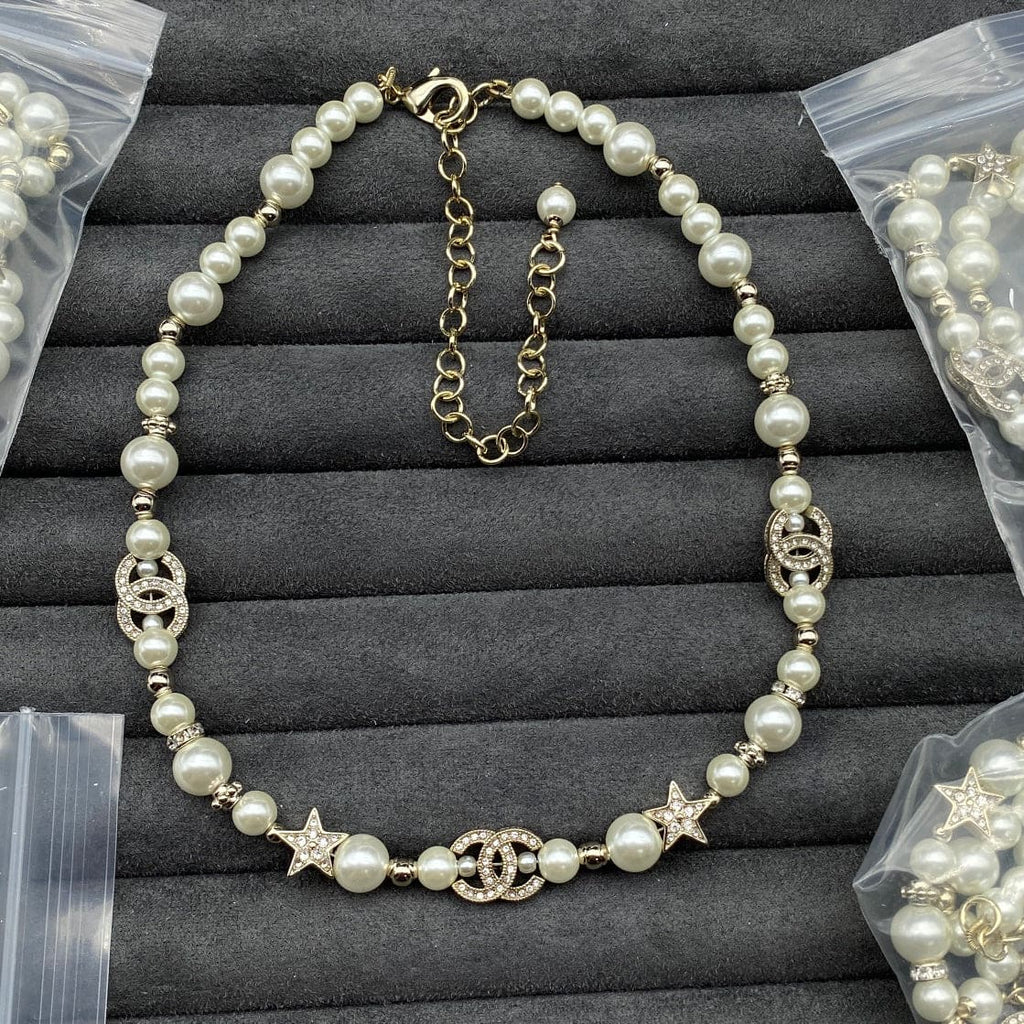 Chanel Pearls & Stars 18K Gold Necklace product image 2, provided for visual reference and product detail review