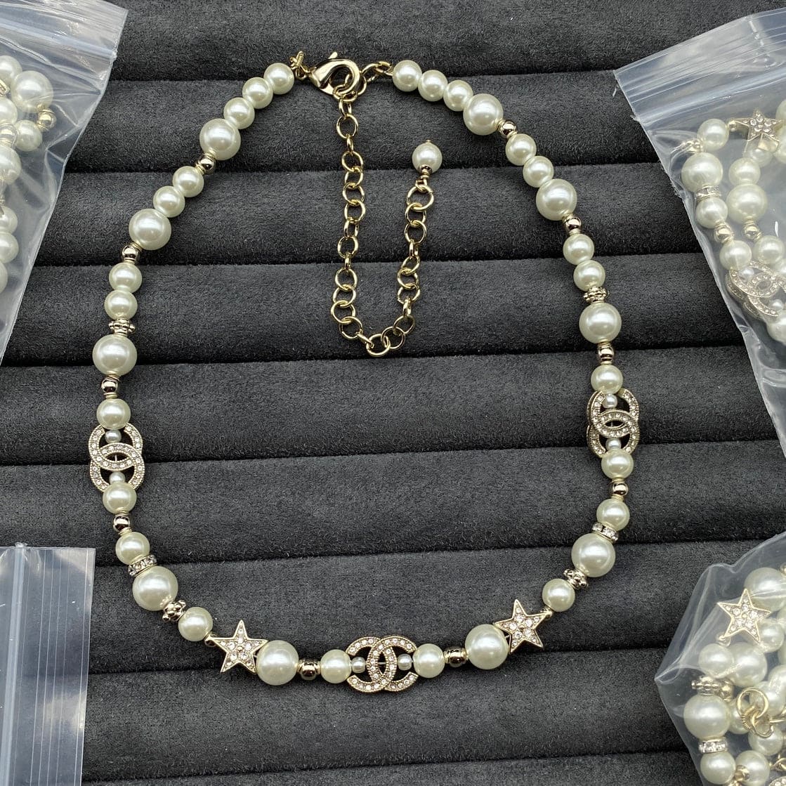 Chanel Pearls & Stars 18K Gold Necklace product image 2, provided for visual reference and product detail review