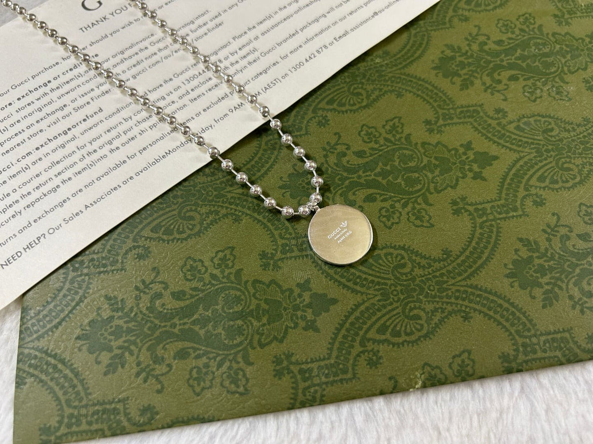 Double Gucci x Adidas Pendant Boule Necklace product image 2, provided for visual reference and product detail review