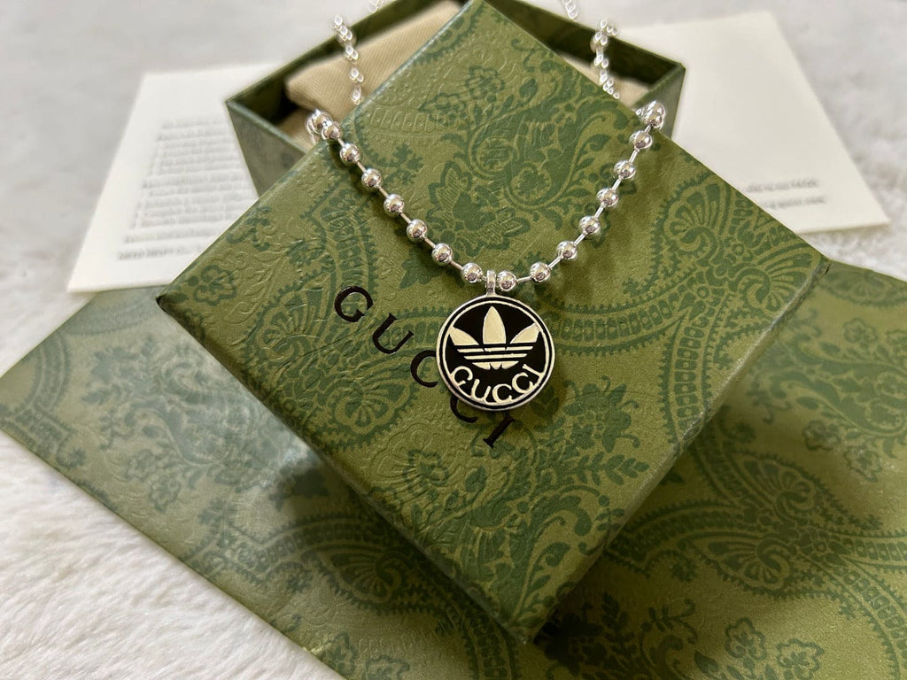 Double Gucci x Adidas Pendant Boule Necklace product image 5, provided for visual reference and product detail review