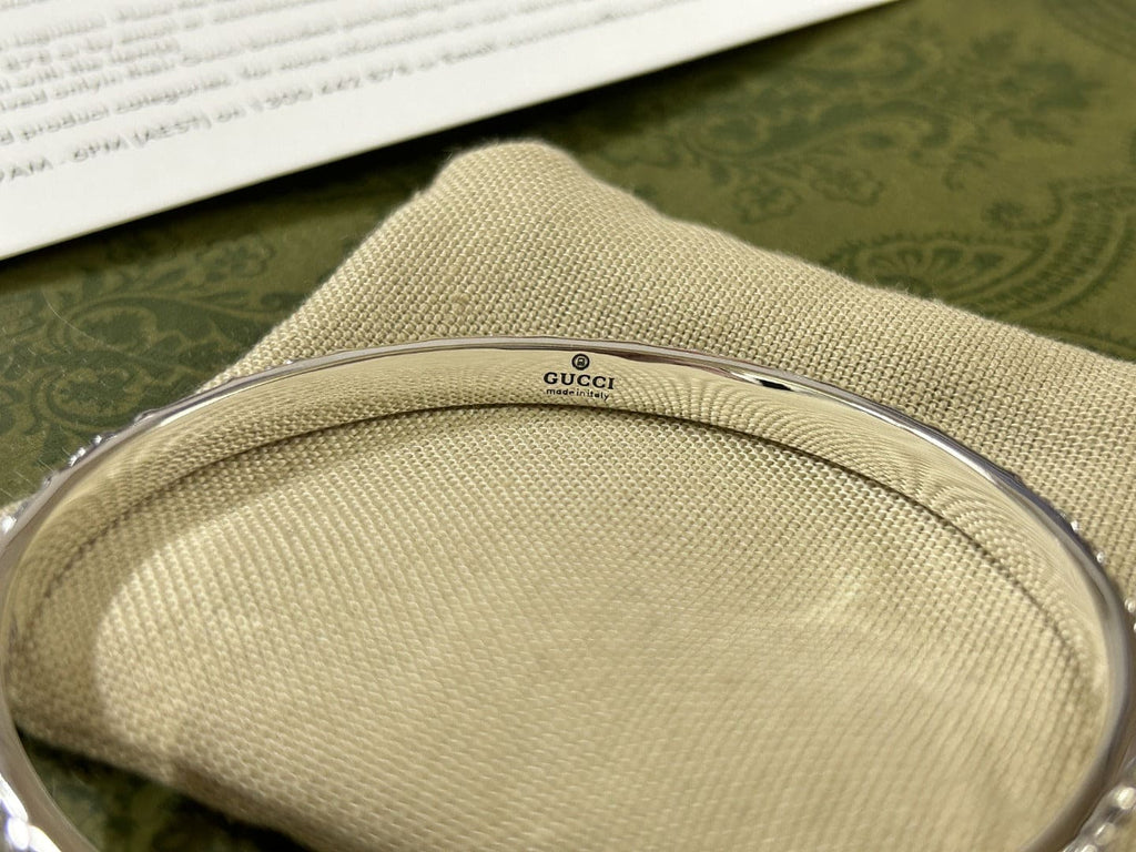 Double Gucci Interlocking Gucci Cuff With Flowers Bracelet product image 10, provided for visual reference and product