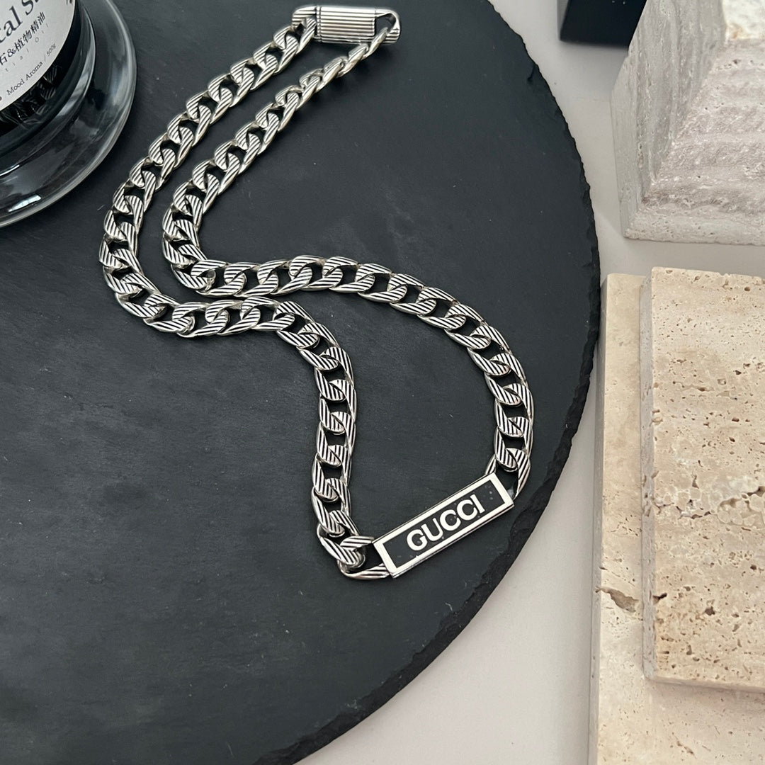 Double Gucci Logo Enamel Chain Necklace product image 6, provided for visual reference and product detail review