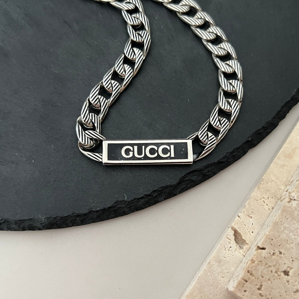 Double Gucci Logo Enamel Chain Necklace product image 11, provided for visual reference and product detail review