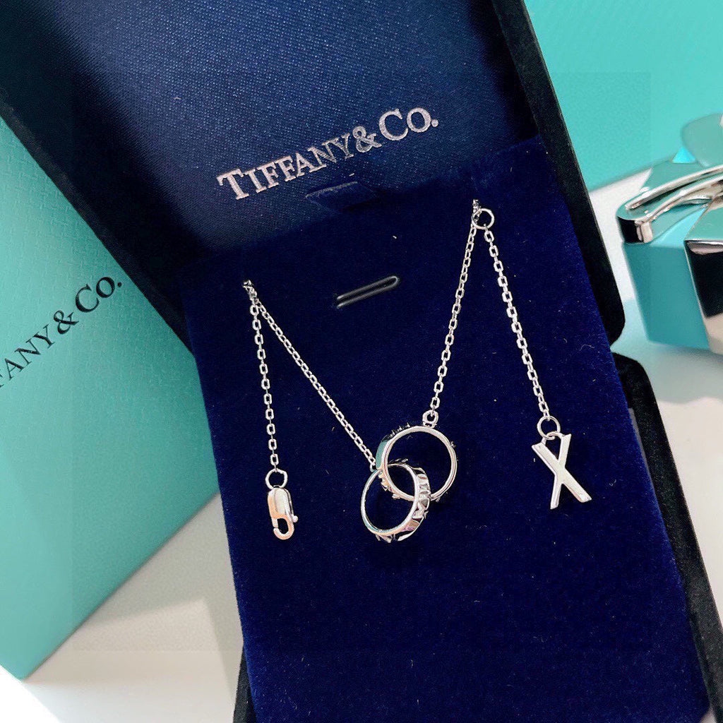 Tiffany Atlas X Closed Interlocking Pendant 18K Gold Necklace product image 5, provided for visual reference and product