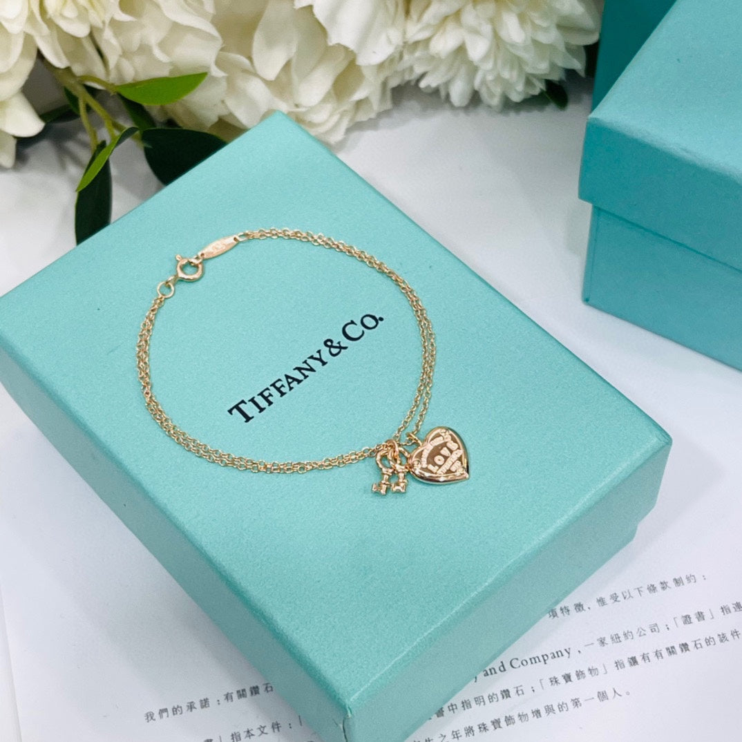 Tiffany Heart Tag Key 18K Gold Bracelet product image 2, provided for visual reference and product detail review
