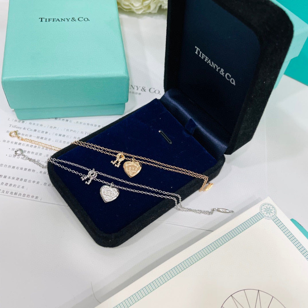 Tiffany Heart Tag Key 18K Gold Bracelet product image 10, provided for visual reference and product detail review