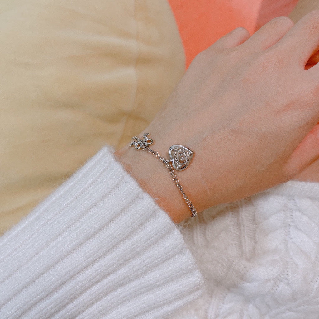 Tiffany Heart Tag Key 18K Gold Bracelet product image 7, provided for visual reference and product detail review