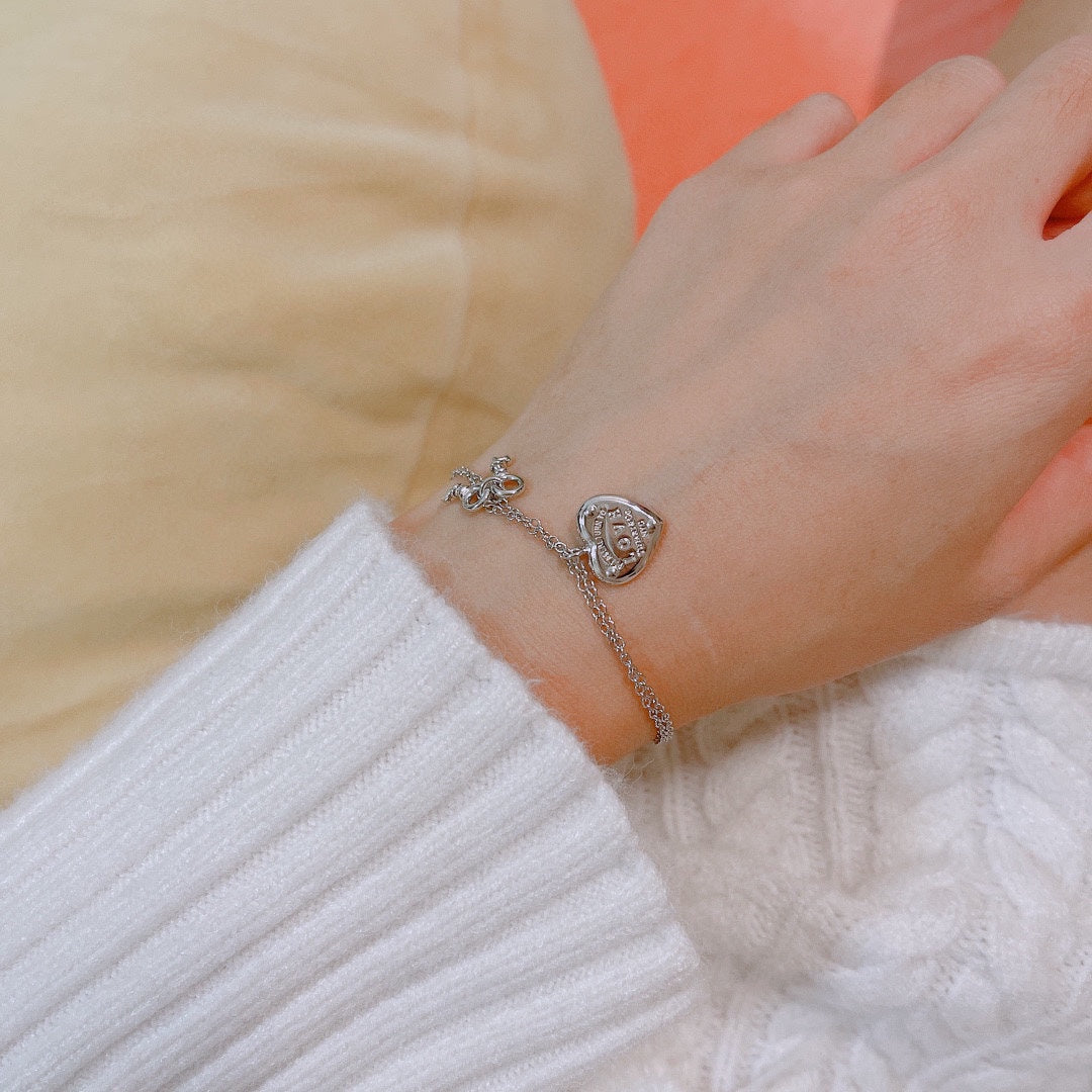 Tiffany Heart Tag Key 18K Gold Bracelet product image 7, provided for visual reference and product detail review