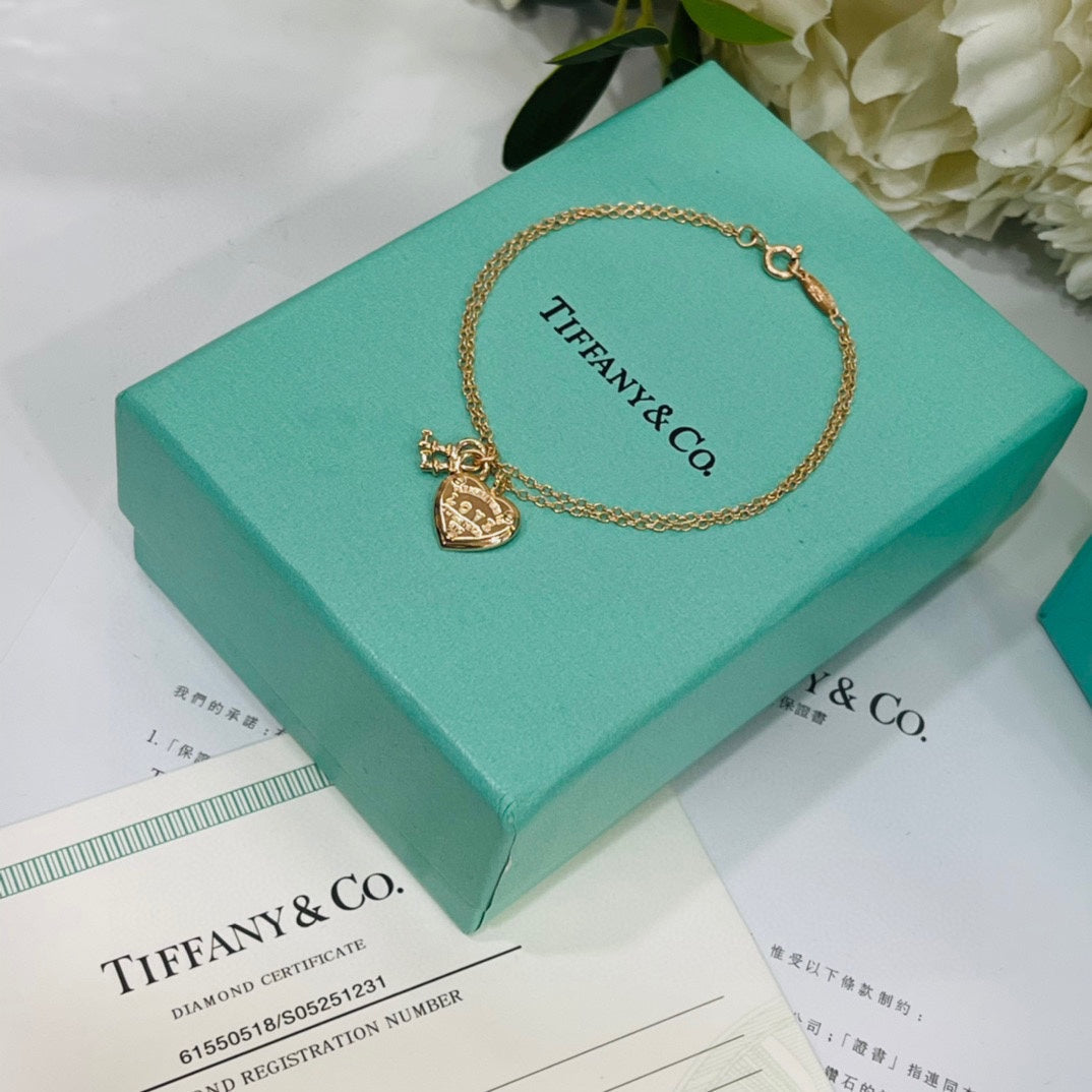 Tiffany Heart Tag Key 18K Gold Bracelet product image 6, provided for visual reference and product detail review