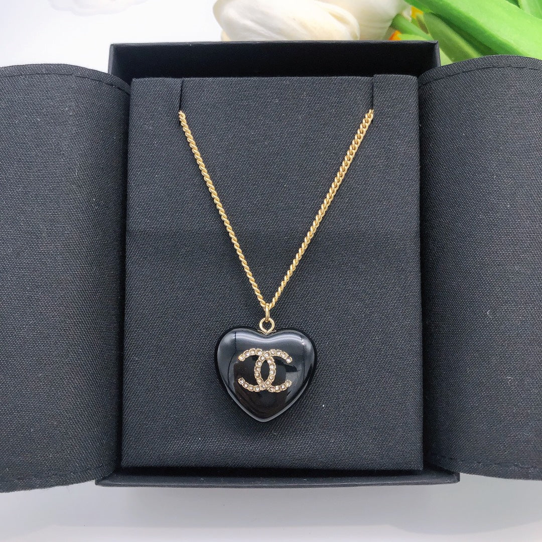 Chanel Black Heart 18K Gold Necklace product image 1, provided for visual reference and product detail review