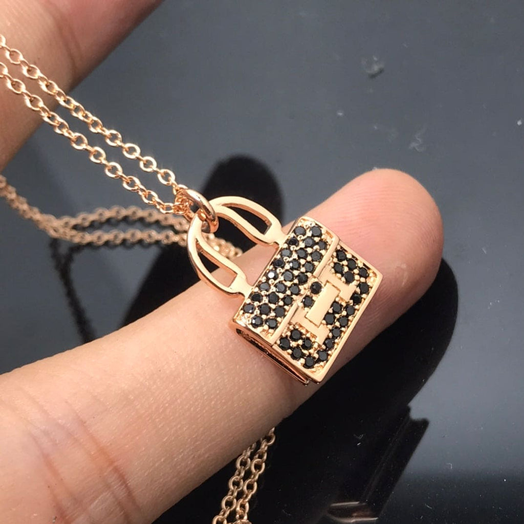 Hermes Amulettes Kelly Black Diamonds 18K Gold Necklace product image 2, provided for visual reference and product detail