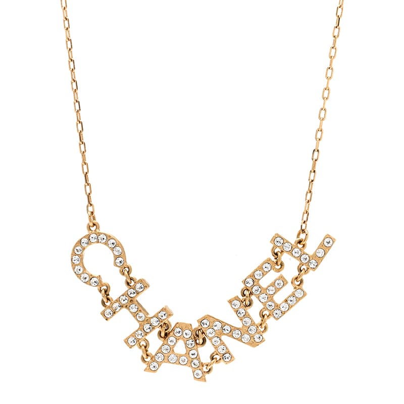 Chanel Crystal 90's Icon Logo 18K Gold Necklace product image 1, provided for visual reference and product detail review