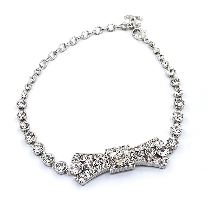 Chanel Diamond Bow Tie Pendant 18K Gold Necklace product image 1, provided for visual reference and product detail review