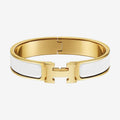Hermes White Clic 18K Gold Bracelet product image 1, provided for visual reference and product detail review