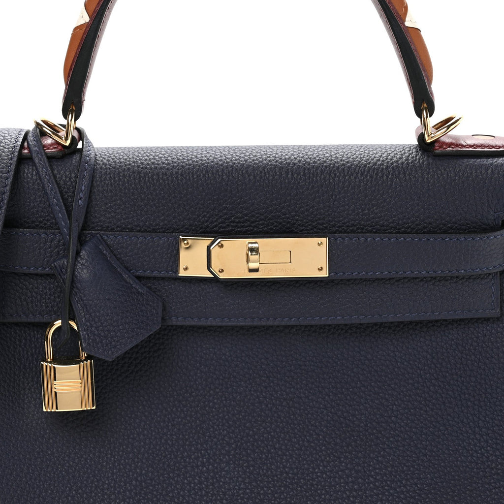 Togo Horseshoe Au Galop Kelly Retourne 28 Bleu Nuit Rouge H Fauve product image 8, provided for visual reference and product