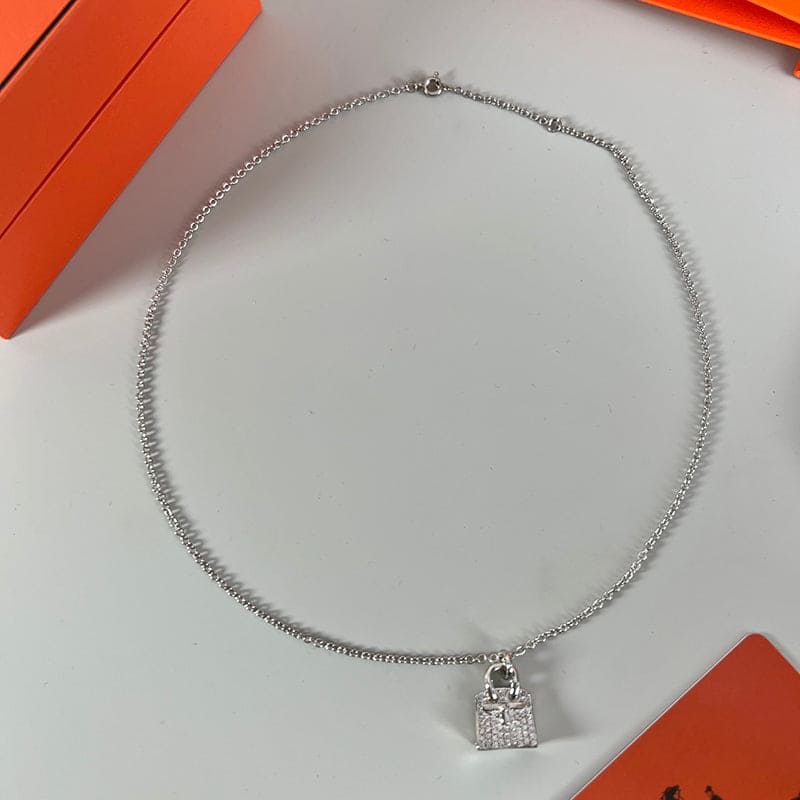 Hermes Amulettes Birkin Pendant 18K Gold Necklace product image 4, provided for visual reference and product detail review