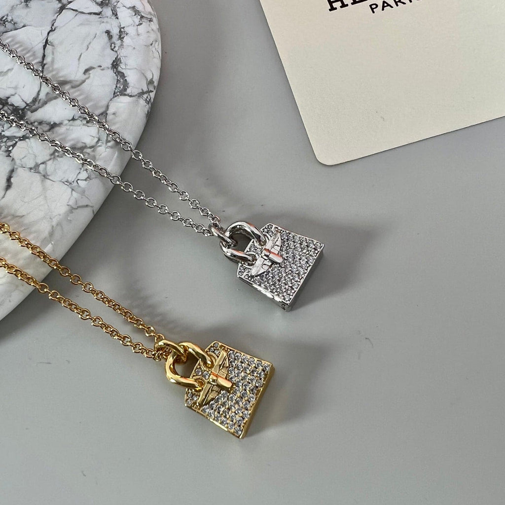 Hermes Amulettes Birkin Pendant 18K Gold Necklace product image 5, provided for visual reference and product detail review