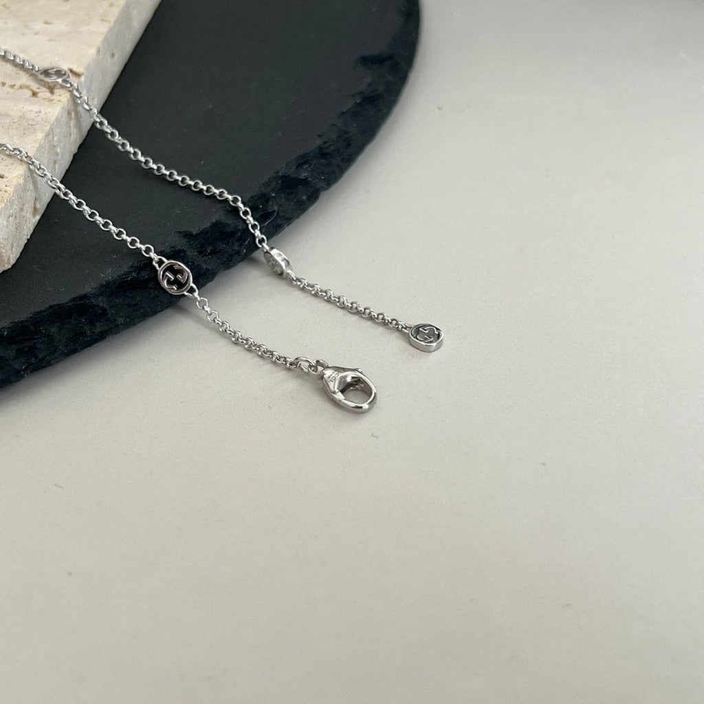 Double Gucci Interlocking Gucci Heart Lightning Charm Necklace product image 5, provided for visual reference and product