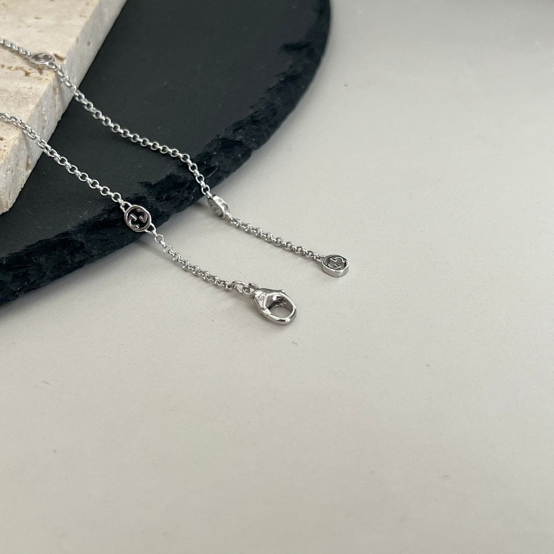 Double Gucci Interlocking Gucci Heart Lightning Charm Necklace product image 5, provided for visual reference and product