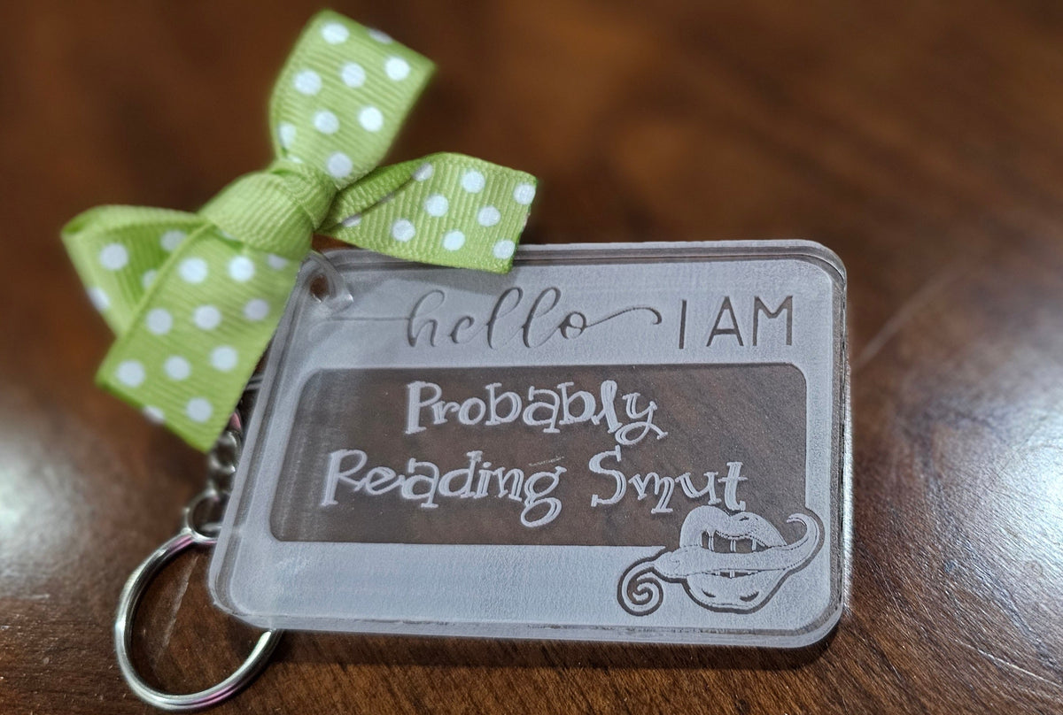 Acrylic Hello, I am Probably Reading Smut Keychain / luggage tag product image 1, provided for visual reference and product