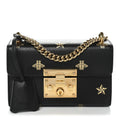 Grained Calfskin Bee Star Small Padlock Shoulder Bag Black product image 1, provided for visual reference and product detail