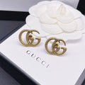 Gucci Double 18K Gold Earrings product image 1, provided for visual reference and product detail review