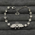 Double Gucci Interlocking Gucci Bee Crystals Bracelet product image 1, provided for visual reference and product detail