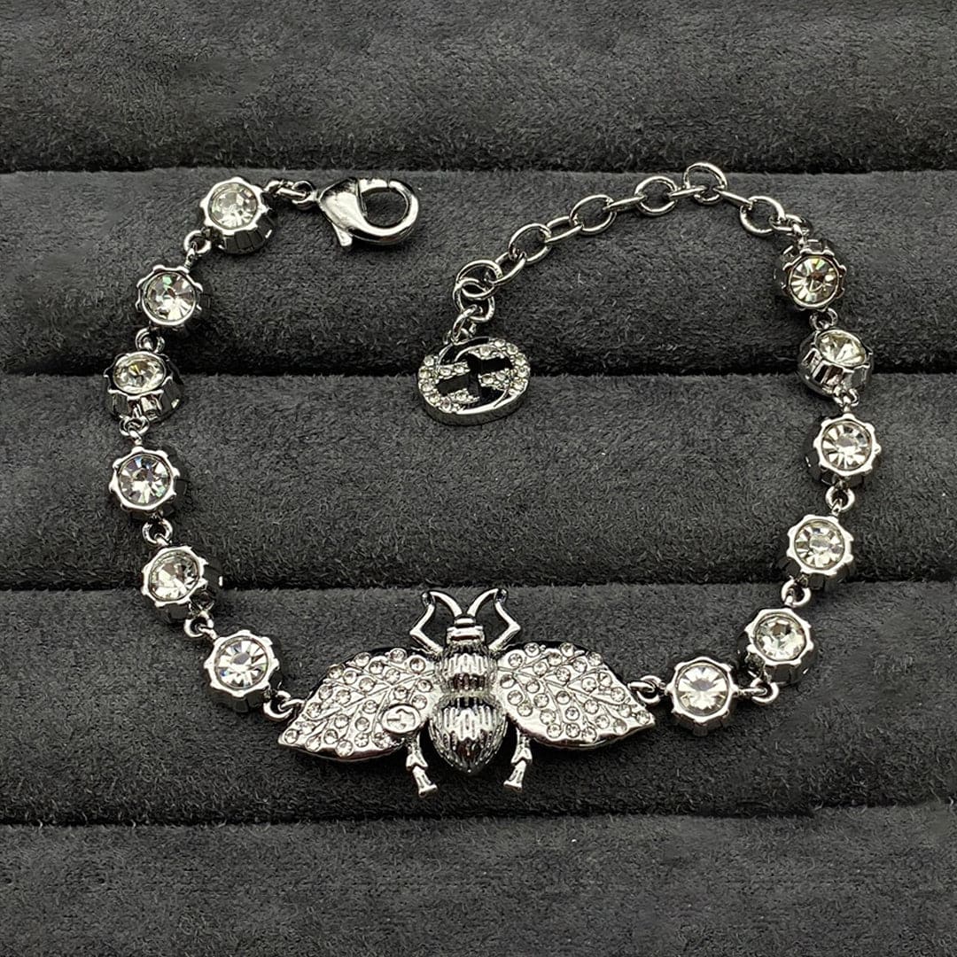 Double Gucci Interlocking Gucci Bee Crystals Bracelet product image 1, provided for visual reference and product detail
