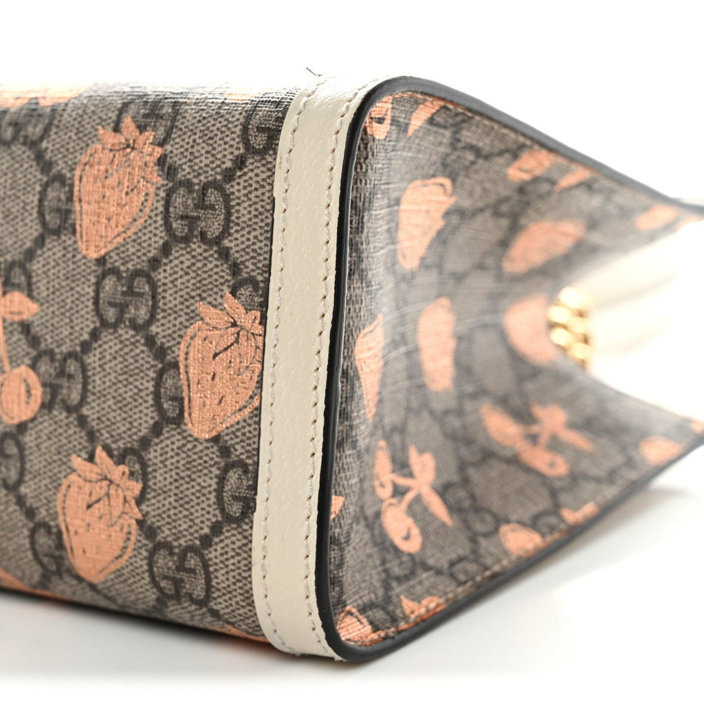 GG Supreme Monogram Berry Textured Dollar Calfskin Small Padlock Tote Beige Ebony Light Copper Mystic White product image