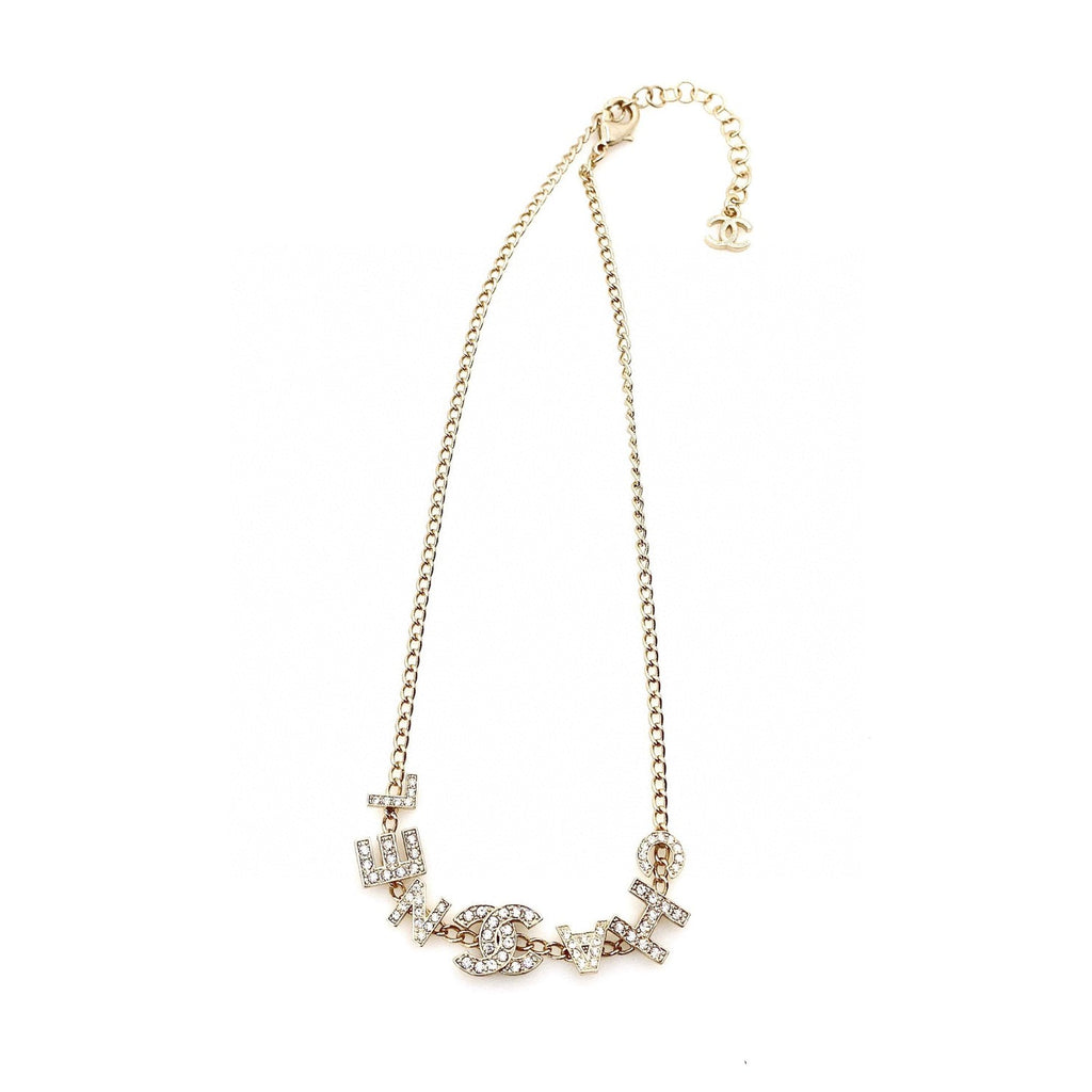 Chanel Script Diamonds 18K Gold Necklace product image 1, provided for visual reference and product detail review