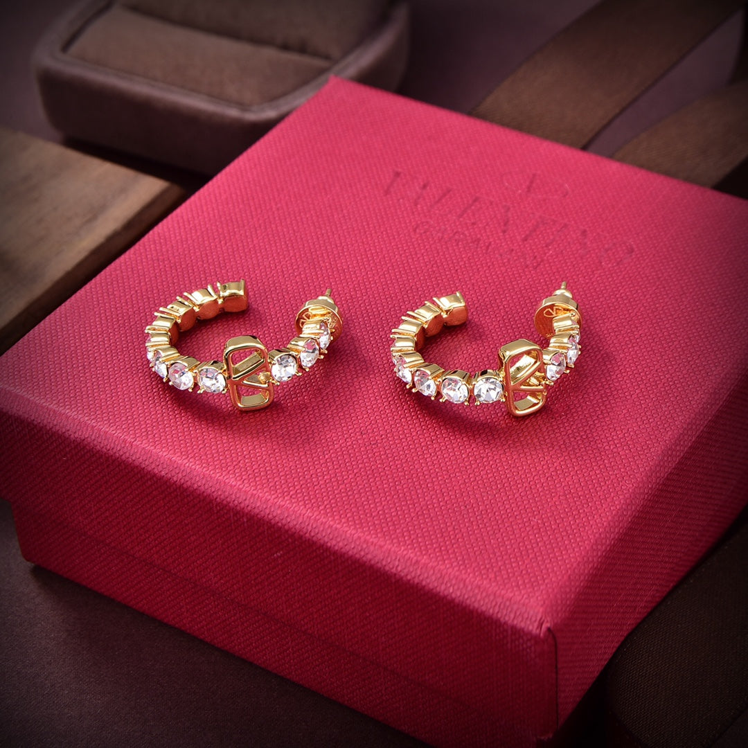 Valentino Valentino Signature 18K Gold Earrings product image 2, provided for visual reference and product detail review