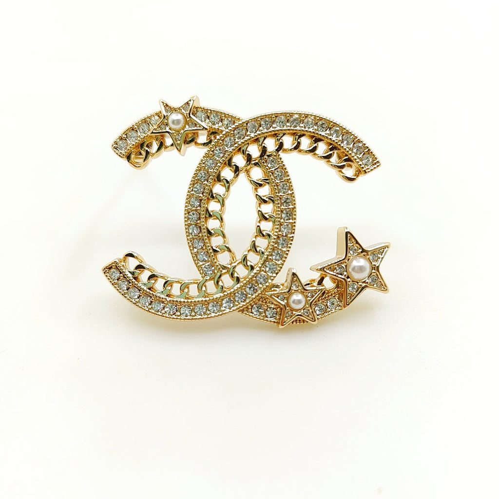 Chanel Star Crystal 18K Gold Brooch product image 1, provided for visual reference and product detail review